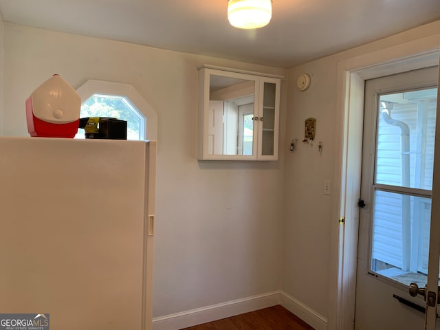 doorway featuring dark hardwood / wood-style flooring