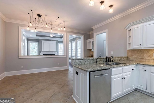 kitchen with white cabinets, kitchen peninsula, stainless steel dishwasher, ornamental molding, and sink