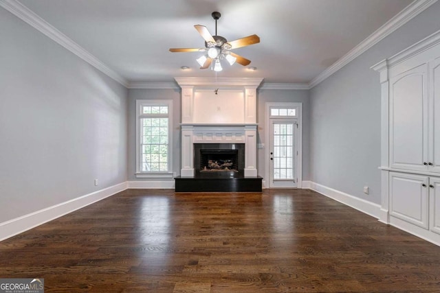 unfurnished living room with crown molding, dark hardwood / wood-style flooring, and ceiling fan