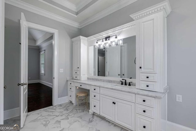 bathroom with hardwood / wood-style flooring, vanity, and crown molding