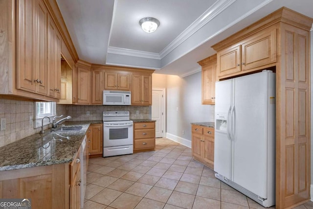 kitchen with dark stone counters, sink, decorative backsplash, white appliances, and light tile patterned floors