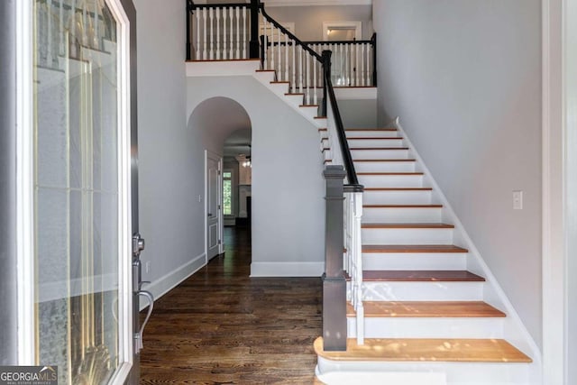 stairway featuring hardwood / wood-style floors