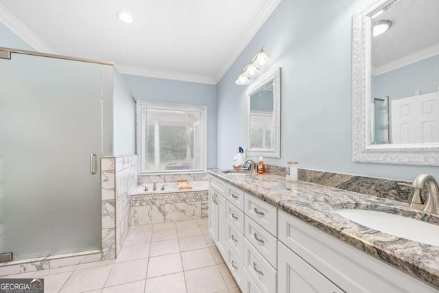 bathroom featuring vanity, ornamental molding, independent shower and bath, and tile patterned floors