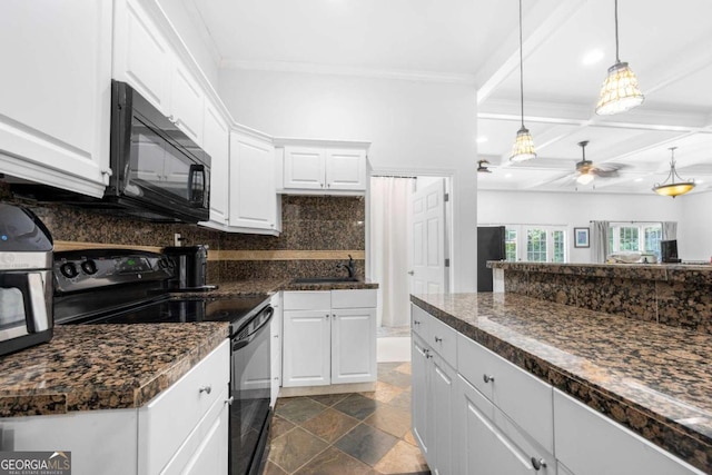 kitchen featuring decorative backsplash, beam ceiling, white cabinetry, black appliances, and coffered ceiling