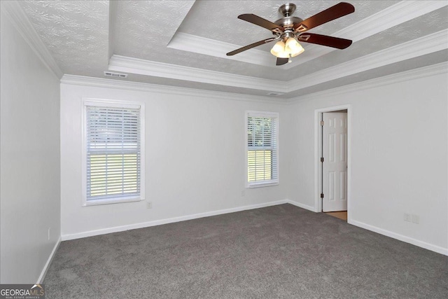 80 Stewart Hollow Ln, Covington, GA 30016 - empty room with a tray ceiling, a textured ceiling, and visible vents