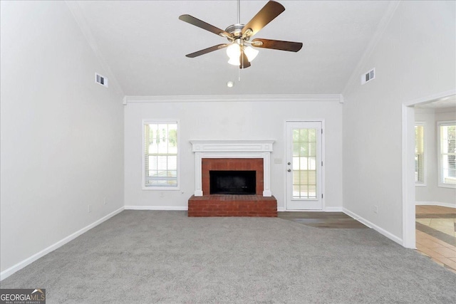 80 Stewart Hollow Ln, Covington, GA 30016 - unfurnished living room with crown molding, a fireplace, and visible vents