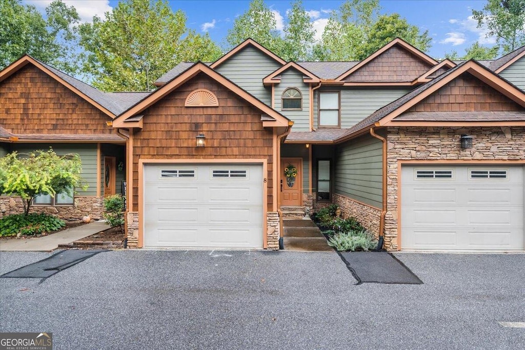 craftsman house with a garage