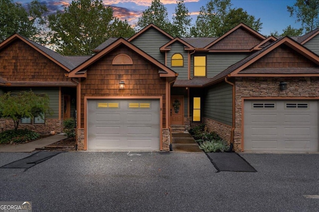 craftsman-style home featuring a garage