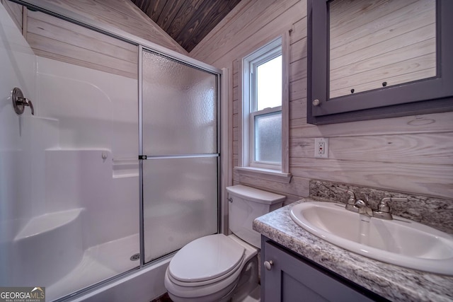 bathroom with wood ceiling, a shower with shower door, vanity, wooden walls, and toilet