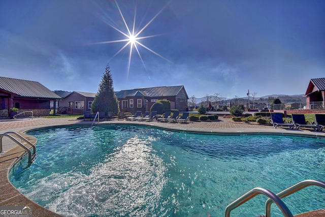 view of pool with a patio area