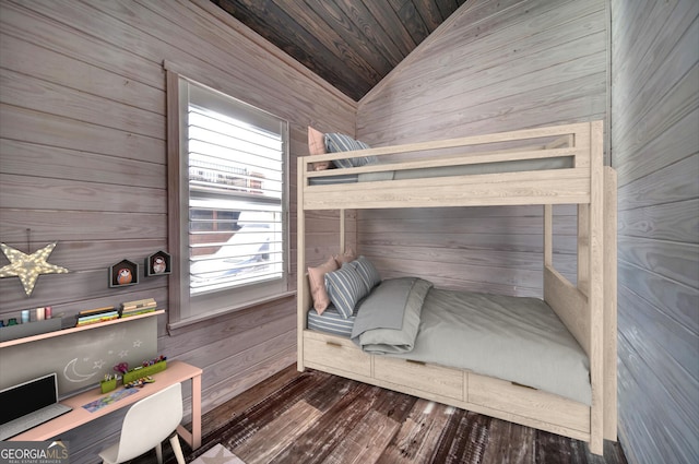 bedroom with wooden walls, vaulted ceiling, and dark wood-type flooring