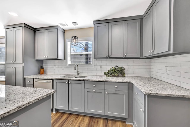 179 Bamboo Pt, Hartwell, GA 30643 - kitchen featuring gray cabinets, decorative backsplash, and recessed lighting