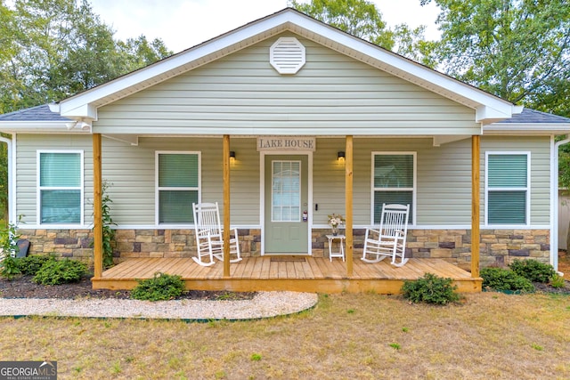 179 Bamboo Pt, Hartwell, GA 30643 - view of front facade with stone siding and a shingled roof