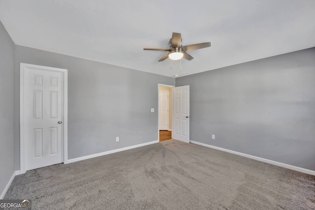 179 Bamboo Pt, Hartwell, GA 30643 - carpeted empty room with ceiling fan and baseboards
