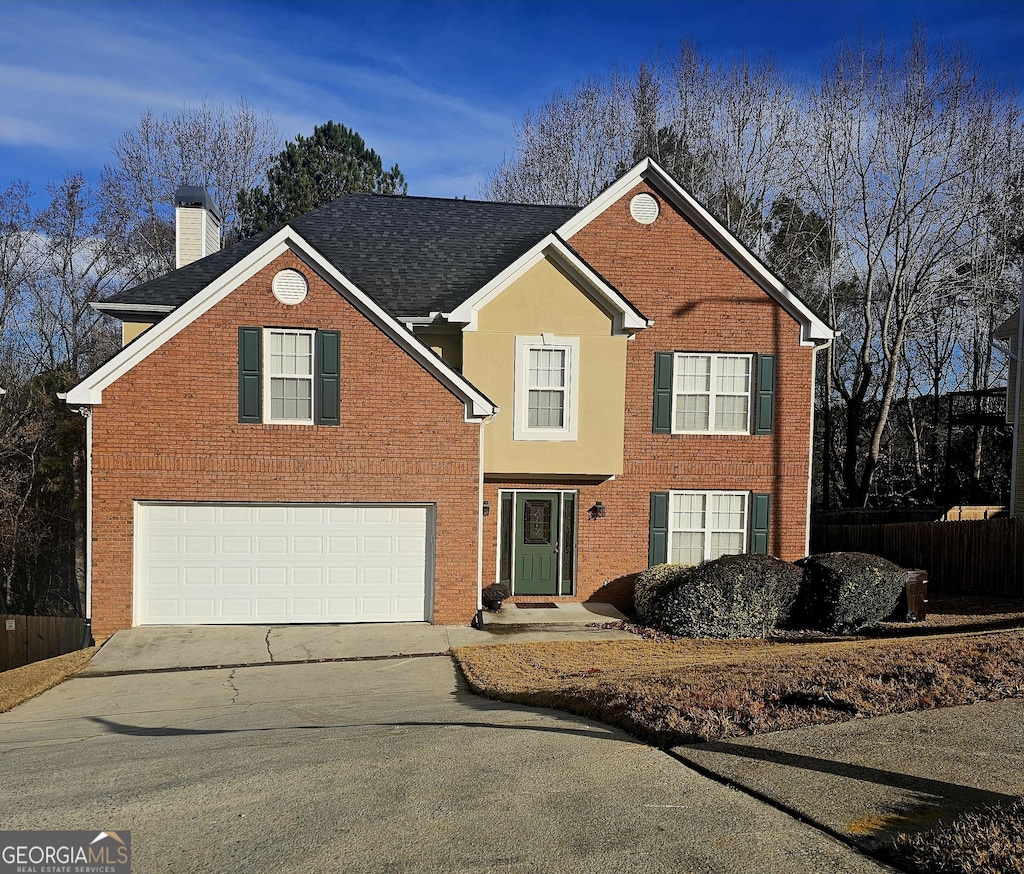 front of property featuring a garage