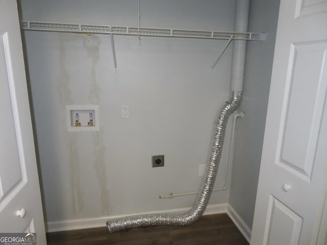 laundry room featuring hookup for an electric dryer, hookup for a washing machine, and dark wood-type flooring