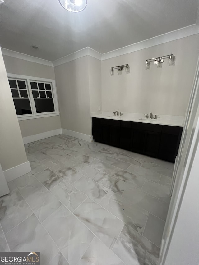 bathroom with vanity and crown molding