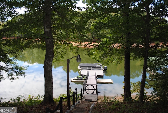 view of dock with a water view