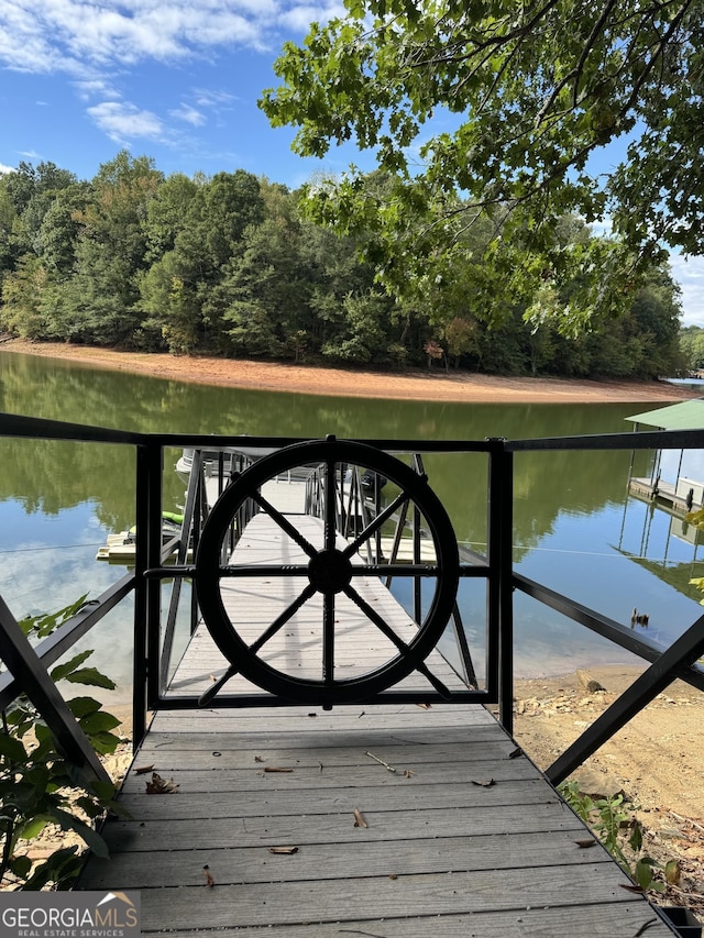 view of dock with a water view