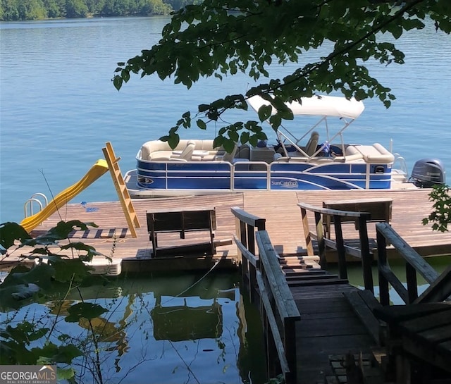 dock area featuring a water view