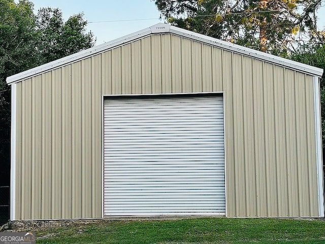 view of outdoor structure with a garage