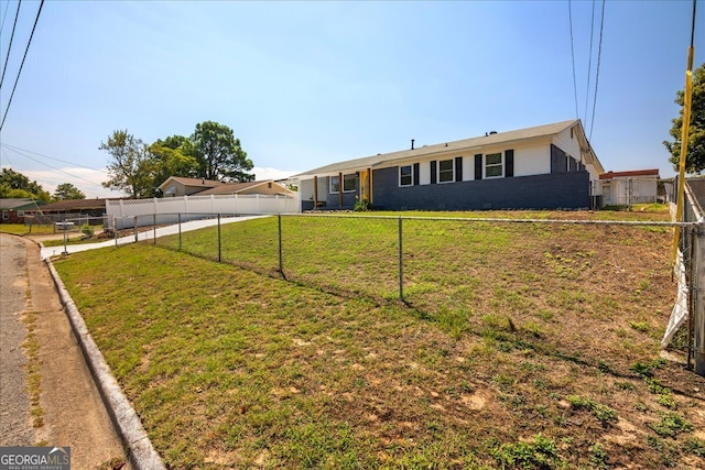 exterior space with a front yard