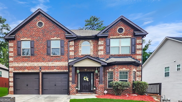 view of front of home with a garage