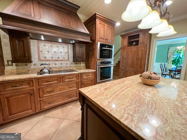 kitchen with custom exhaust hood, crown molding, decorative backsplash, black electric cooktop, and light stone counters