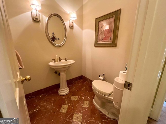 bathroom featuring toilet