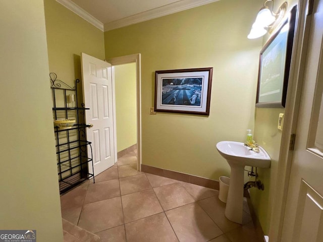 bathroom featuring tile patterned flooring and ornamental molding