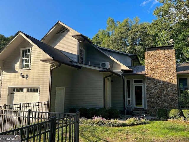 front of property featuring a garage