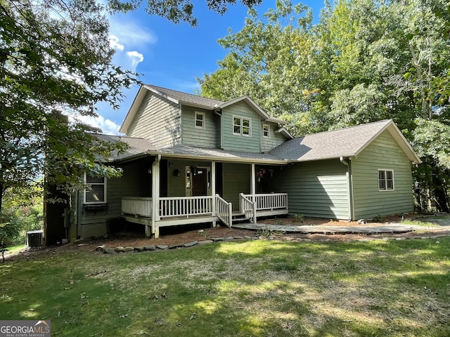 view of front of property with a front lawn and covered porch