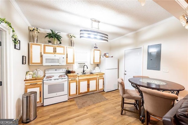 kitchen with electric panel, sink, white appliances, light wood-type flooring, and crown molding