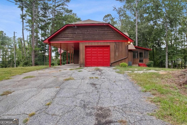 garage featuring a carport