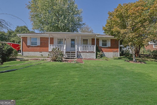 ranch-style home with a front yard and covered porch