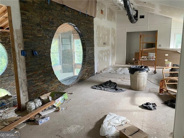 interior space featuring lofted ceiling