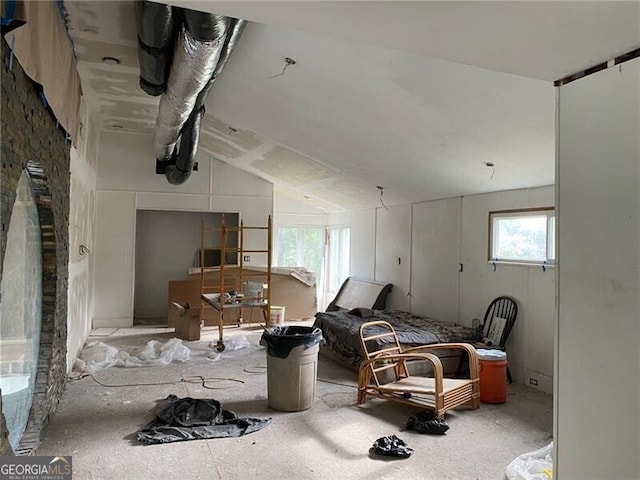 bedroom with lofted ceiling