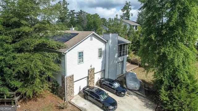 exterior space featuring a garage