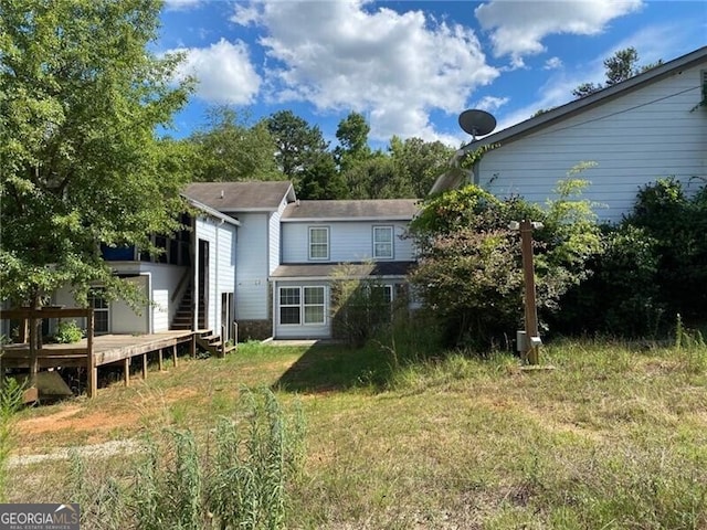 view of yard featuring a wooden deck