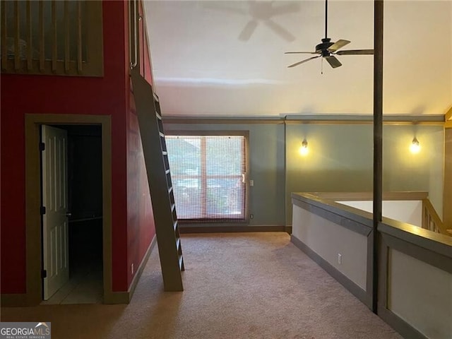 interior space featuring ceiling fan