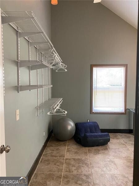 laundry room with tile patterned flooring