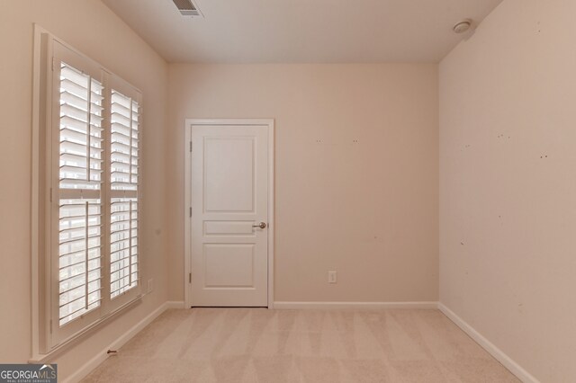 view of carpeted spare room