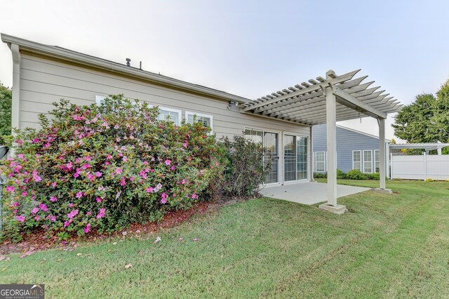 view of yard with a patio and a pergola