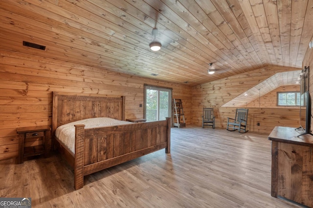 bedroom featuring multiple windows, wood ceiling, and vaulted ceiling