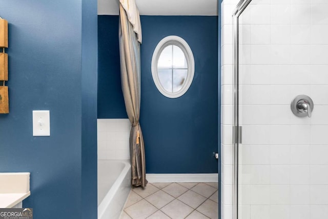 bathroom featuring independent shower and bath, tile patterned flooring, and vanity