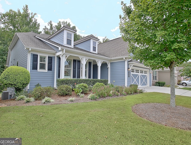 cape cod home featuring central AC, a front yard, and a porch