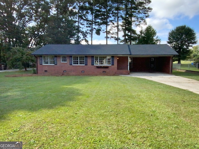 single story home featuring a front yard and a carport