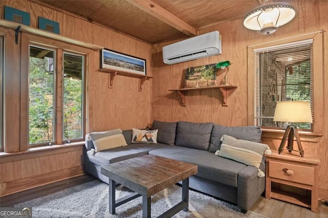 sunroom with beam ceiling, wooden ceiling, and a wall unit AC