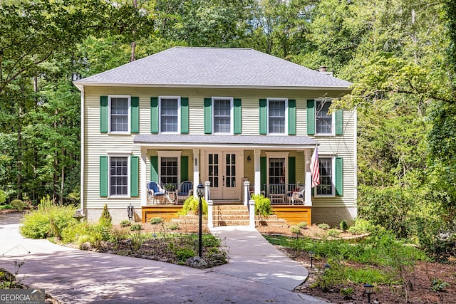 colonial house featuring a porch