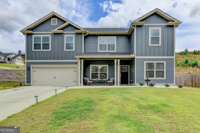 craftsman-style home with a front yard and a garage